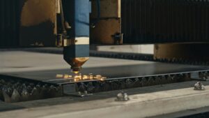 CNC fiber laser cutting machine in action, precision fabrication services in North Las Vegas.
