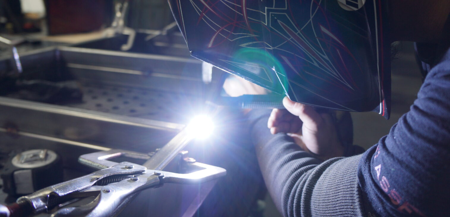 Metal fabrication process with welding and laser cutting equipment.