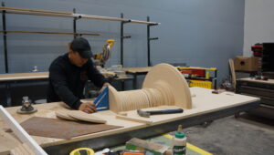 Carpentry and millwork fabrication with custom wood elements and precision tooling.