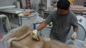 Fiberglass fabrication process with skilled craftsman working on a large-scale project in North Las Vegas,