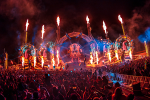 Large-scale event stage fabrication with fire and lighting for EDC festival.