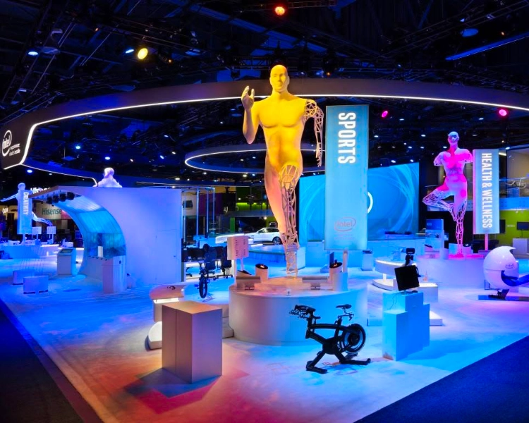Custom-fabricated trade show exhibit with branded structures and interactive display features.